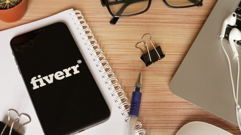 Fiverr Phone App Laptop Glasses Desk