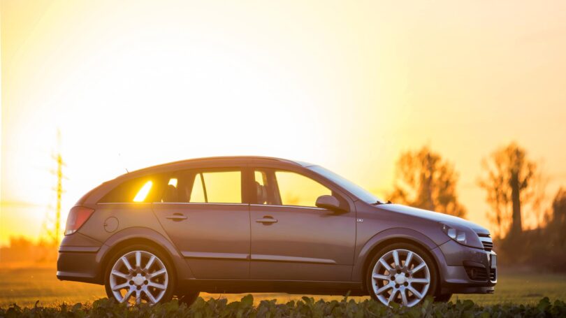 Gray Car Parked Outdoors Sunset