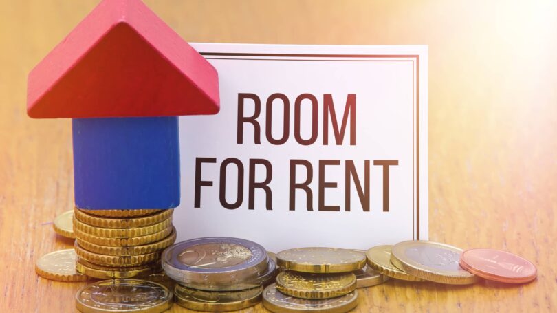 Room For Rent Coins Stacked Sign Blocks House